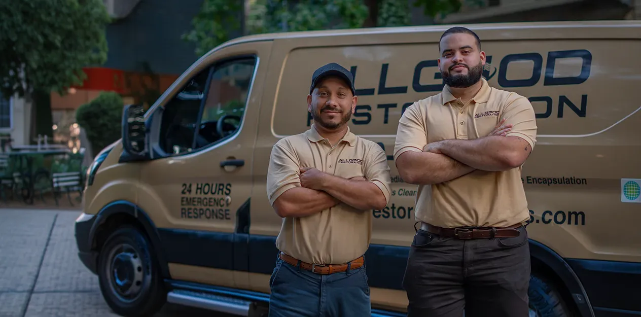 Our founders in front of one of our vans.